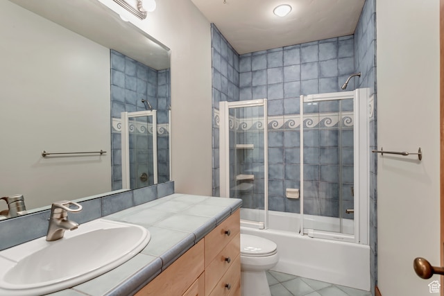 4345 W Stoneybrook Cir, Alpine, UT 84004 - full bathroom with tile flooring, combined bath / shower with glass door, toilet, and oversized vanity