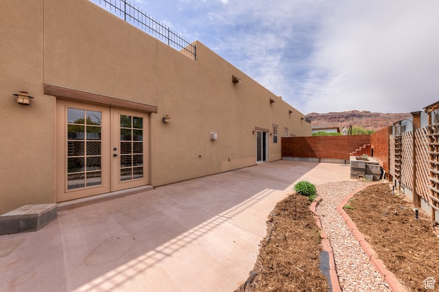 1145 E Bonita St, Moab, UT 84532 - exterior space featuring a mountain view, french doors, and a patio area