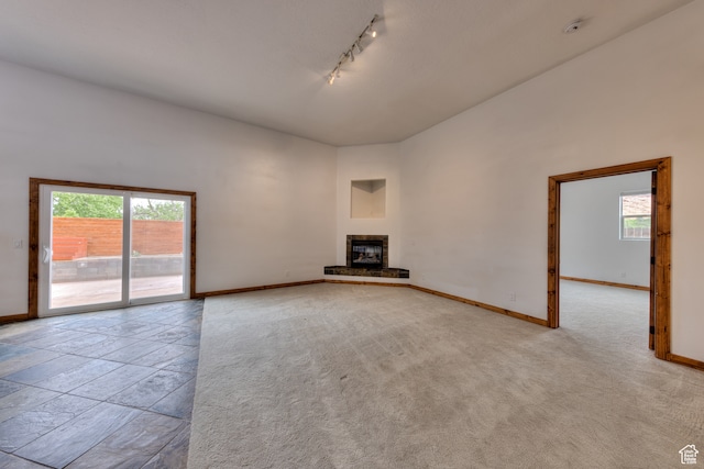 1145 E Bonita St, Moab, UT 84532 - empty room featuring a healthy amount of sunlight, light tile floors, and track lighting