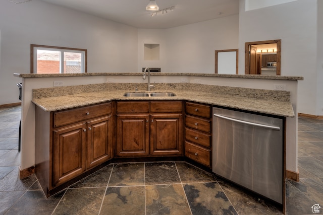 1145 E Bonita St, Moab, UT 84532 - kitchen featuring sink, dishwasher, dark tile flooring, and light stone countertops