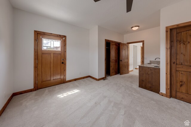 1145 E Bonita St, Moab, UT 84532 - carpeted entryway with sink