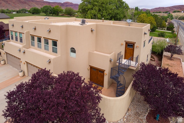 1145 E Bonita St, Moab, UT 84532 - exterior space with a garage and a mountain view