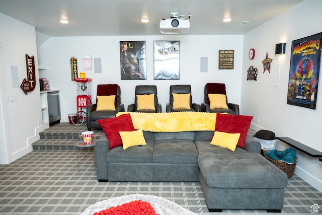 carpeted living area featuring baseboards, recessed lighting, and visible vents