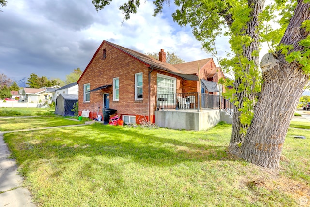 390 N 100 E, Spanish Fork, UT 84660 - view of home's exterior featuring a lawn