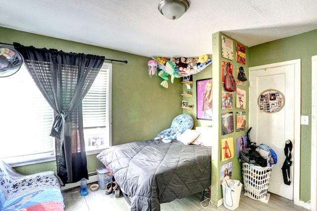 390 N 100 E, Spanish Fork, UT 84660 - bedroom with wood-type flooring and a textured ceiling