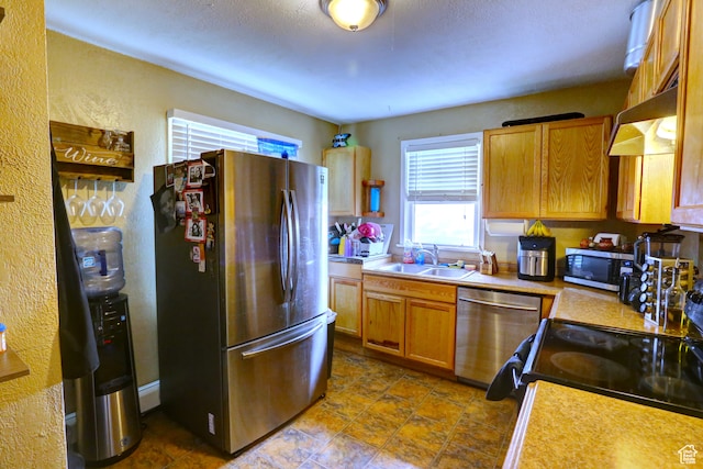 390 N 100 E, Spanish Fork, UT 84660 - kitchen with tile flooring, sink, appliances with stainless steel finishes, and wall chimney exhaust hood