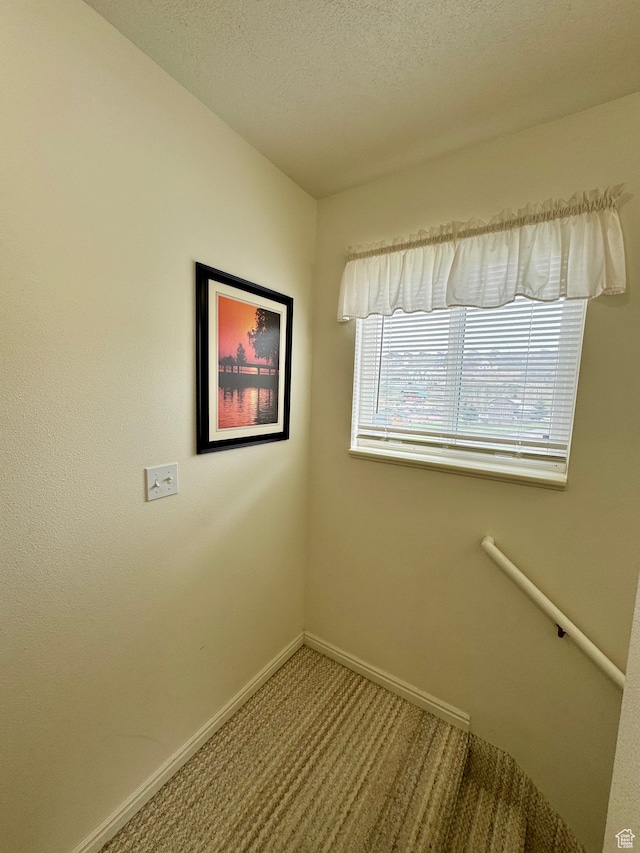 888 N Newburg Dr Unit 1, Garden City, UT 84028 - unfurnished room featuring baseboards and carpet