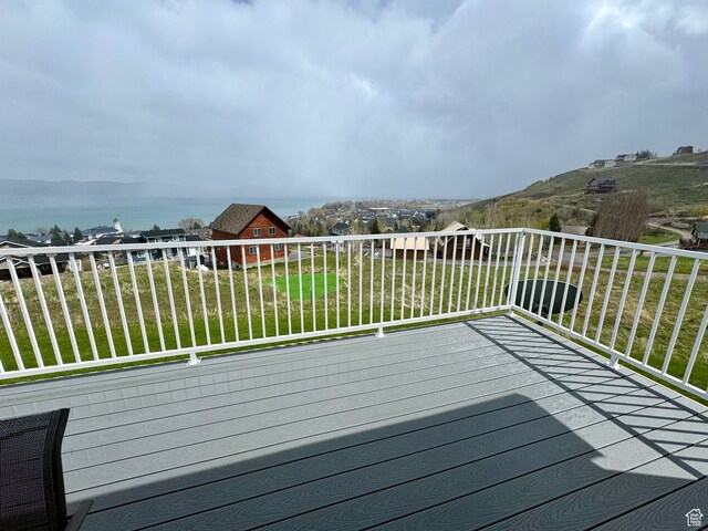 888 N Newburg Dr Unit 1, Garden City, UT 84028 - wooden deck featuring a yard