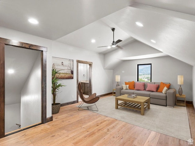 living area with lofted ceiling, light wood-style flooring, recessed lighting, baseboards, and a ceiling fan