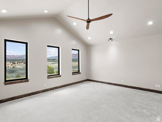 empty room featuring high vaulted ceiling, visible vents, baseboards, concrete floors, and recessed lighting