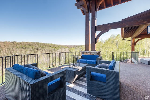 2586 N Whispering Springs Hollow Rd Unit 20, Heber City, UT 84032 - view of patio / terrace with an outdoor living space and a forest view