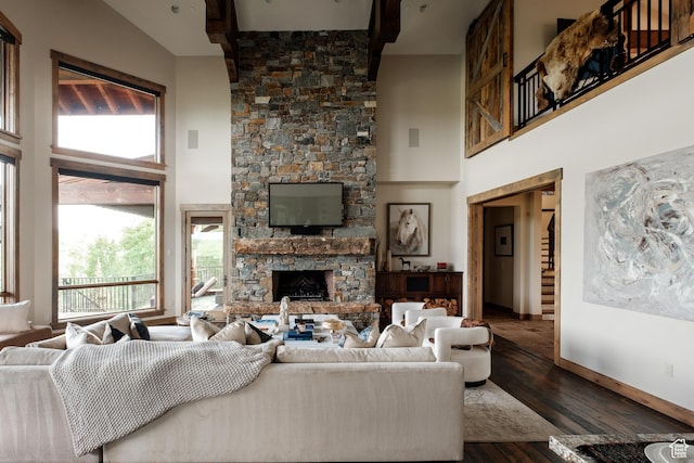 2586 N Whispering Springs Hollow Rd Unit 20, Heber City, UT 84032 - living area with a fireplace, a high ceiling, and wood finished floors