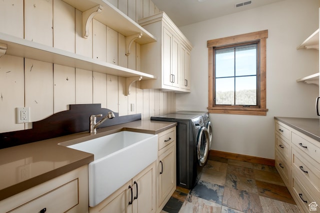 2586 N Whispering Springs Hollow Rd Unit 20, Heber City, UT 84032 - laundry room with separate washer and dryer, stone tile flooring, and cabinet space