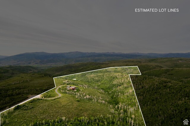 2586 N Whispering Springs Hollow Rd Unit 20, Heber City, UT 84032 - aerial view of property's location with a mountainous background and property parcel outlined