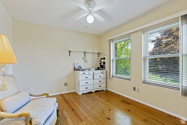 142 S Eccles Ave, Ogden, UT 84404 - living area with ceiling fan and light hardwood / wood-style floors