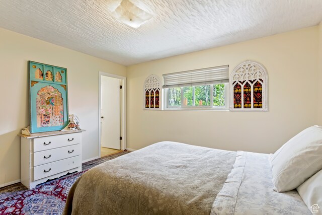 142 S Eccles Ave, Ogden, UT 84404 - bedroom featuring a textured ceiling