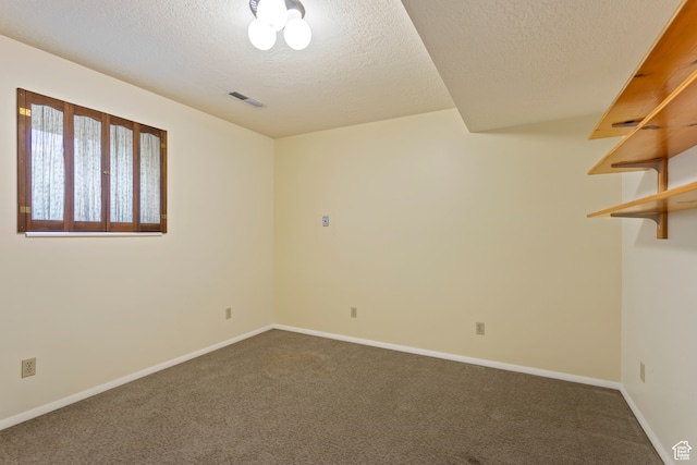 142 S Eccles Ave, Ogden, UT 84404 - carpeted spare room featuring a textured ceiling