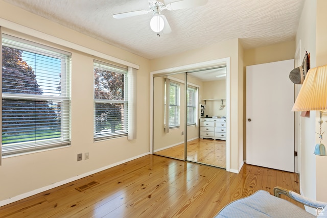142 S Eccles Ave, Ogden, UT 84404 - bedroom with a closet, light hardwood / wood-style floors, and ceiling fan