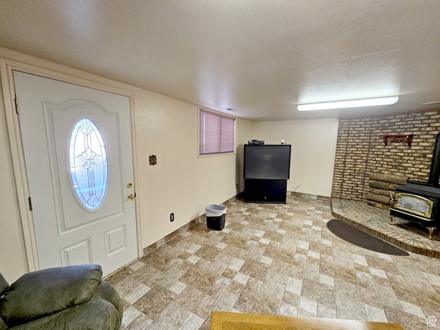 816 N 3500 W, Vernal, UT 84078 - entryway with a wood stove and light stone finish floors