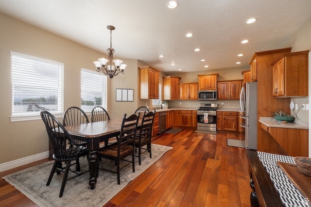 2120 N 2500 W, Vernal, UT 84078 - dining room featuring a chandelier, sink, and dark hardwood / wood-style floors