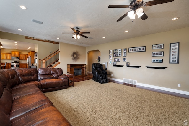 2120 N 2500 W, Vernal, UT 84078 - living room with carpet, ceiling fan, and a textured ceiling