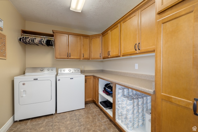 2120 N 2500 W, Vernal, UT 84078 - laundry area featuring cabinets, a textured ceiling, light tile flooring, and washer and clothes dryer