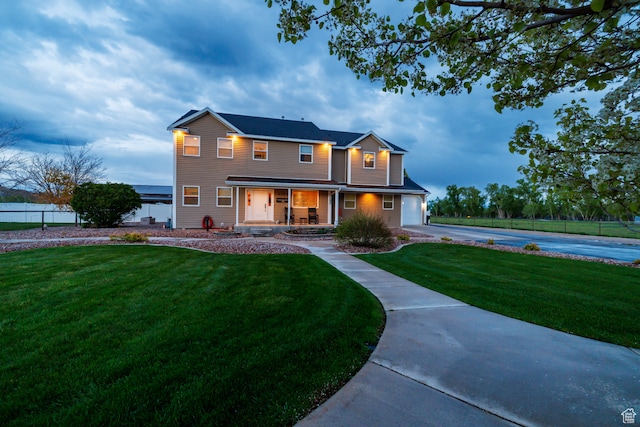 2120 N 2500 W, Vernal, UT 84078 - view of front of property featuring a yard, a porch, and a garage