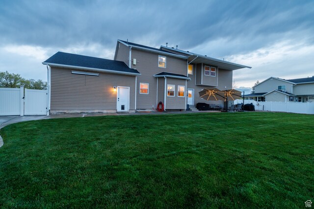 2120 N 2500 W, Vernal, UT 84078 - rear view of property featuring a yard