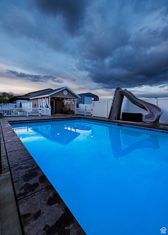 2120 N 2500 W, Vernal, UT 84078 - pool at dusk featuring a water slide