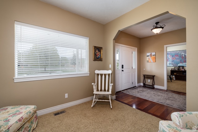 2120 N 2500 W, Vernal, UT 84078 - foyer entrance with a healthy amount of sunlight and dark hardwood / wood-style flooring