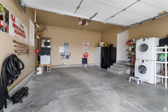 2120 N 2500 W, Vernal, UT 84078 - garage with stacked washer and clothes dryer, a garage door opener, and black fridge with ice dispenser