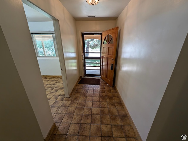 1235 E 820 N, Provo, UT 84606 - doorway featuring visible vents, baseboards, and stone tile flooring