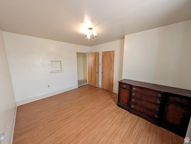 1235 E 820 N, Provo, UT 84606 - unfurnished bedroom featuring baseboards, light wood-type flooring, and a closet