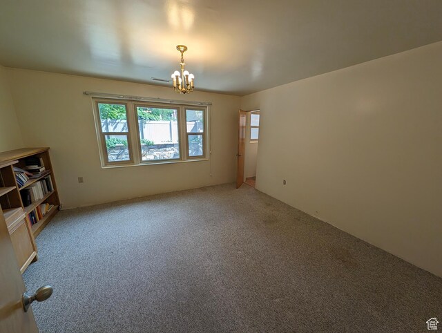 1235 E 820 N, Provo, UT 84606 - unfurnished room featuring a notable chandelier, light colored carpet, and visible vents