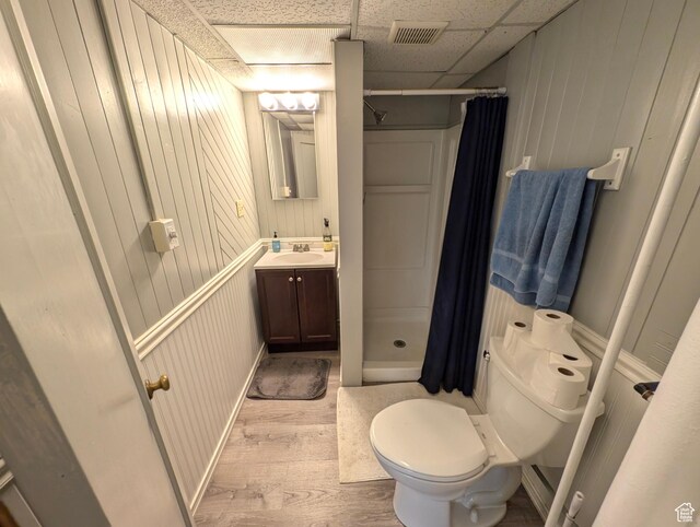 1235 E 820 N, Provo, UT 84606 - bathroom with wood finished floors, toilet, curtained shower, vanity, and visible vents