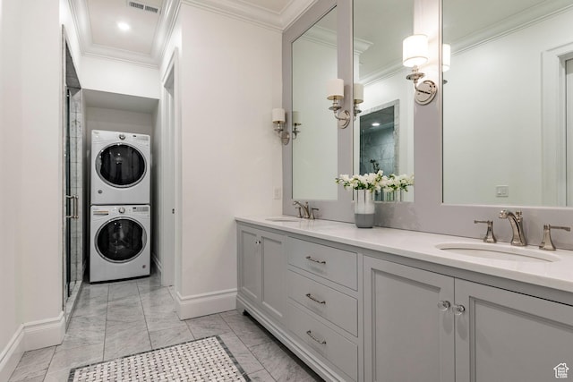 4250 S Camille St, Holladay, UT 84124 - bathroom with walk in shower, ornamental molding, stacked washer and clothes dryer, and vanity