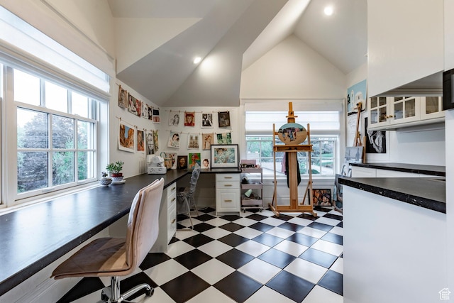 4250 S Camille St, Holladay, UT 84124 - kitchen featuring white cabinetry, a healthy amount of sunlight, built in desk, and high vaulted ceiling