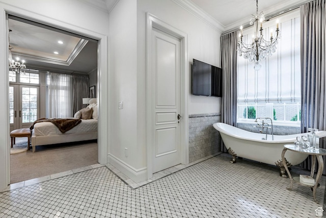 4250 S Camille St, Holladay, UT 84124 - bathroom with tile patterned flooring, a tub to relax in, ornamental molding, and a chandelier