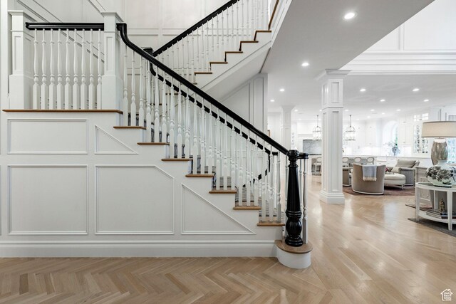 4250 S Camille St, Holladay, UT 84124 - staircase with parquet flooring and ornate columns