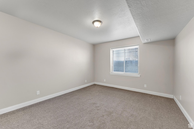 885 S Southflat Rd, Huntington, UT 84528 - carpeted empty room featuring a textured ceiling