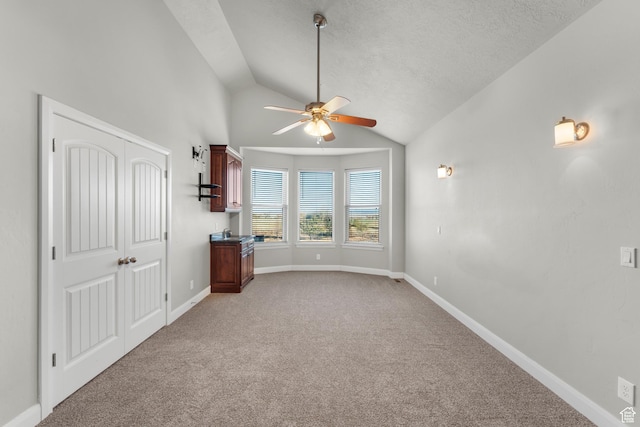 885 S Southflat Rd, Huntington, UT 84528 - carpeted empty room with ceiling fan, a textured ceiling, and lofted ceiling