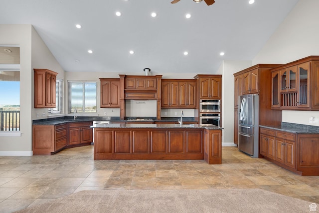 885 S Southflat Rd, Huntington, UT 84528 - kitchen with stainless steel appliances, an island with sink, ceiling fan, and light tile floors
