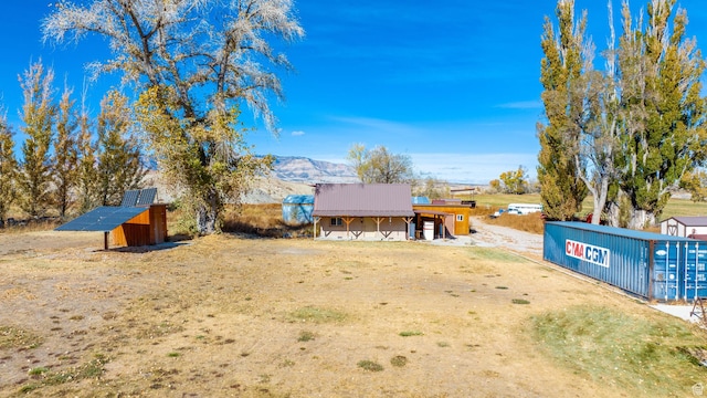 885 S Southflat Rd, Huntington, UT 84528 - exterior space featuring a mountain view and an outdoor structure