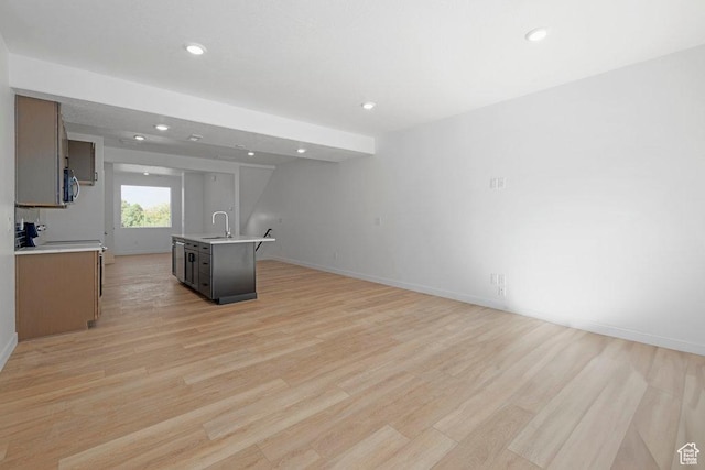 4126 S Winder Ward Dr Unit 2-123, Millcreek, UT 84124 - kitchen with light countertops, open floor plan, a sink, recessed lighting, and baseboards