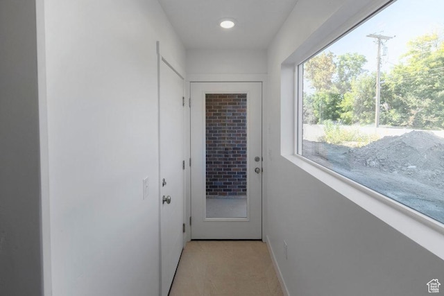 4126 S Winder Ward Dr Unit 2-123, Millcreek, UT 84124 - doorway to outside featuring recessed lighting and baseboards