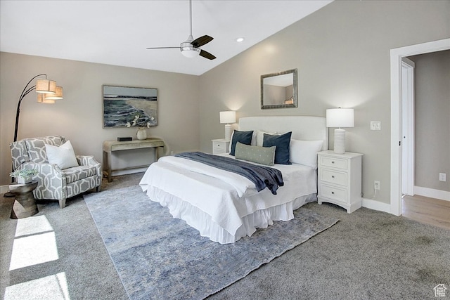 carpeted bedroom featuring high vaulted ceiling and ceiling fan