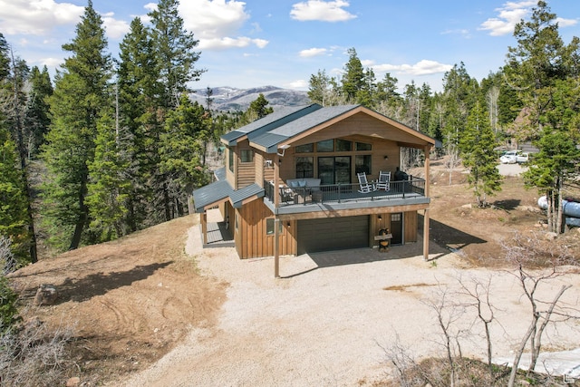 1430 W Arapaho Dr Unit 59, Coalville, UT 84017 - view of front of home featuring a garage and a deck with mountain view