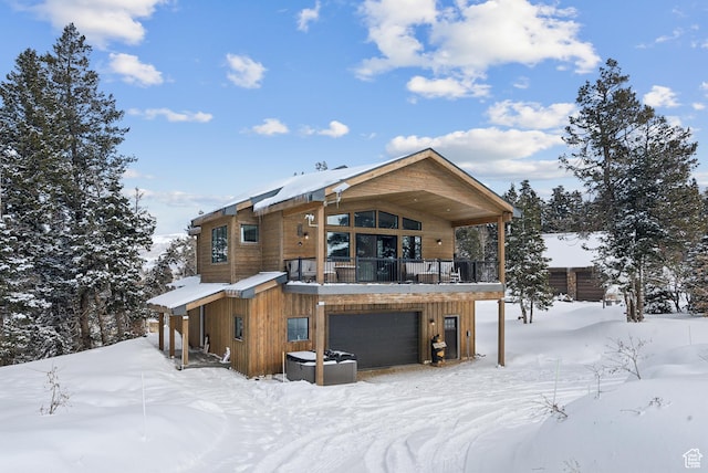 1430 W Arapaho Dr Unit 59, Coalville, UT 84017 - snow covered house with a garage and a balcony