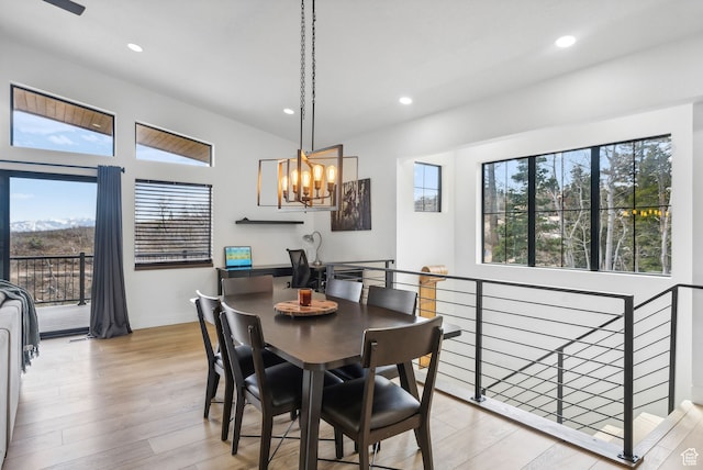 1430 W Arapaho Dr Unit 59, Coalville, UT 84017 - dining space with a notable chandelier and light hardwood / wood-style floors