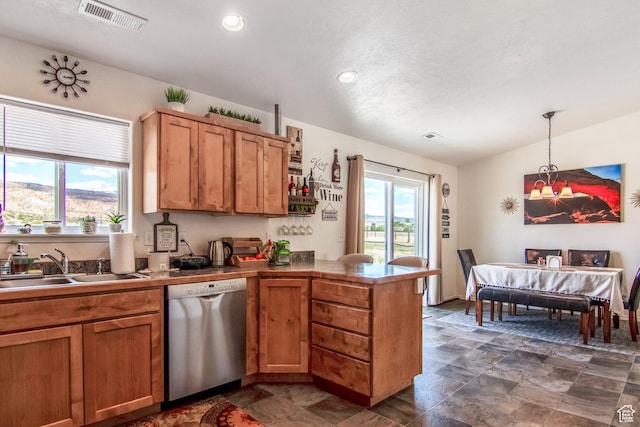 4623 Pueblo Verde Dr, Moab, UT 84532 - kitchen featuring dishwasher, decorative light fixtures, kitchen peninsula, and a wealth of natural light
